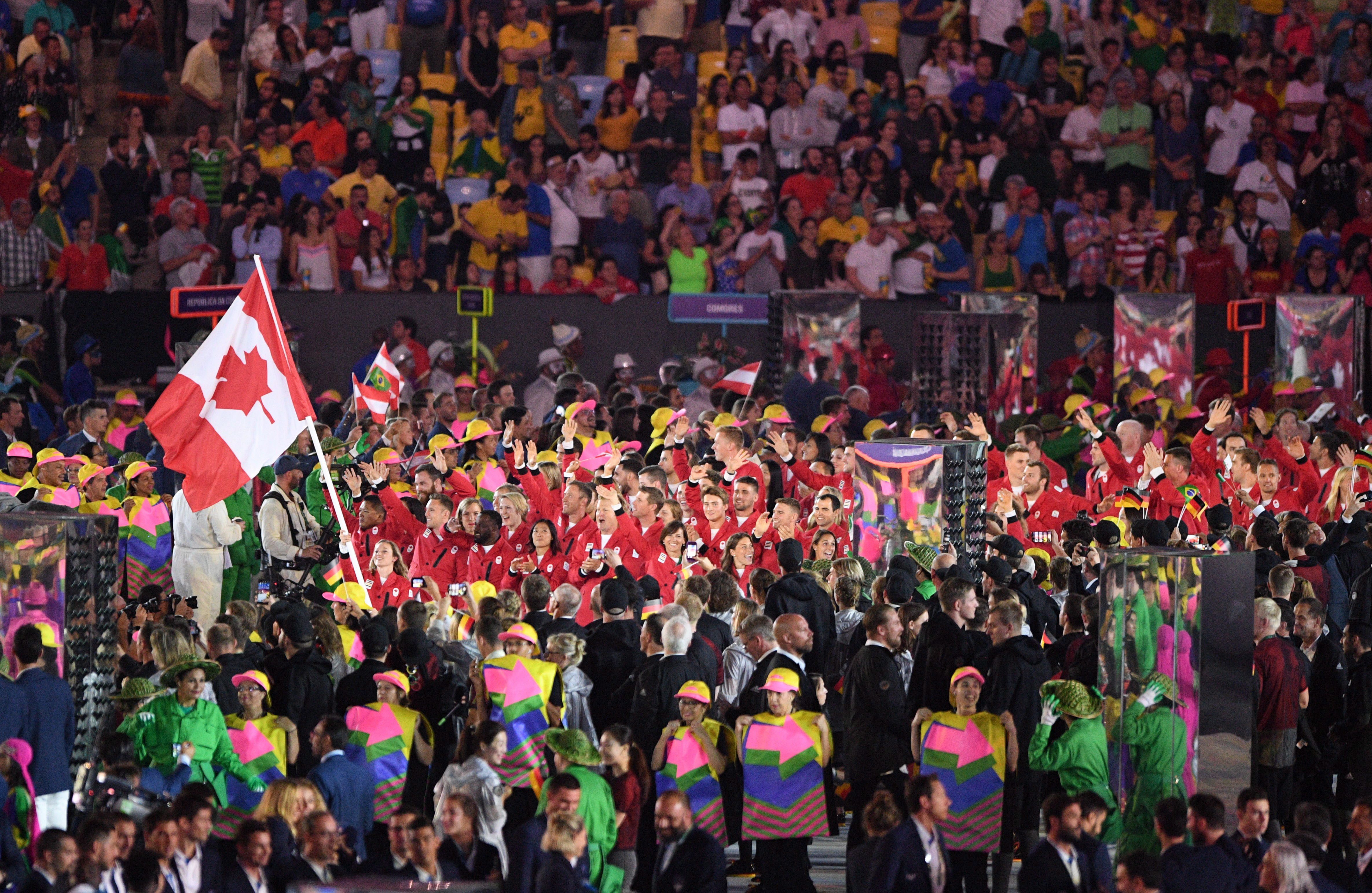 Rosie MacLennan leads team Canada into the stadium during the opening ceremonies at the 2016 Olympic Games in Rio de Janeiro, Brazil on Friday, Aug. 5, 2016. THE CANADIAN PRESS/Sean Kilpatrick
