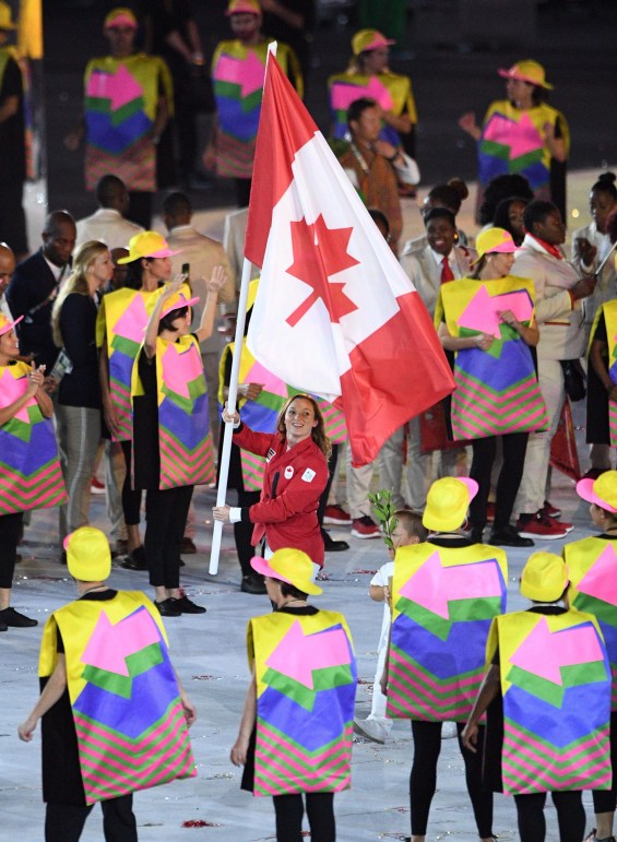 Rosie MacLennan leads team Canada into the stadium during the opening ceremonies at the 2016 Olympic Games in Rio de Janeiro, Brazil on Friday, Aug. 5, 2016. THE CANADIAN PRESS/Sean Kilpatrick