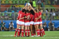 Members of Canada's women's rugby sevens team huddle before bronze medal game action against Great Britain at the 2016 Olympic Games in Rio de Janeiro, Brazil on Monday, Aug. 8, 2016. THE CANADIAN PRESS/Sean Kilpatrick