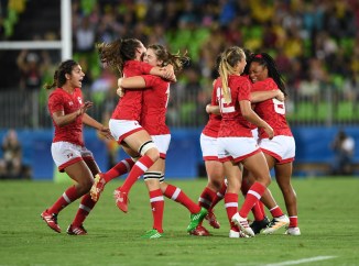 Canada celebrates their win for bronze over Great Britain in women's rugby sevens at the 2016 Olympic Summer Games in Rio de Janeiro, Brazil on Monday, Aug. 8, 2016. THE CANADIAN PRESS/Sean Kilpatrick