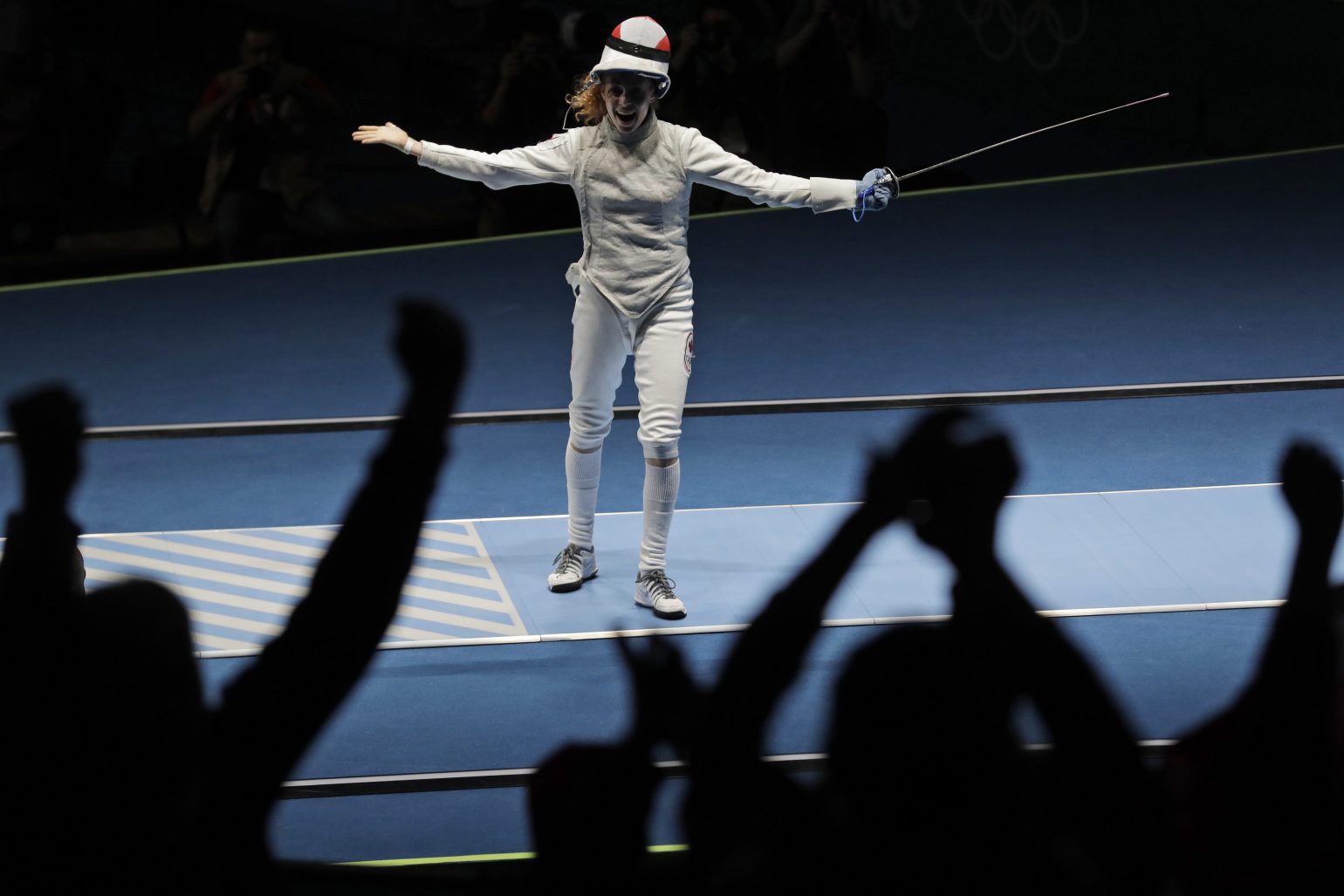 Eleanor Harvey of Canada celebrates after defeating Arianna Errigo of Italy in a women's individual foil event at the 2016 Summer Olympics in Rio de Janeiro, Brazil, Wednesday, Aug. 10, 2016. (AP Photo/Andrew Medichini)