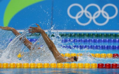 China's Lu Ying, left, and Canada's Hilary Caldwell compete in a women's 200-meter backstroke final during the swimming competitions at the 2016 Summer Olympics, Thursday, Aug. 11, 2016, in Rio de Janeiro, Brazil. (AP Photo/Lee Jin-man)