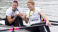 Canadian rowers Lindsay Jennerich and Patricia Obee, right, show off their silver medals in the women's lightweight double sculls at the 2016 Summer Olympics in Rio de Janeiro, Brazil, Friday, Aug. 12, 2016. THE CANADIAN PRESS/Frank Gunn