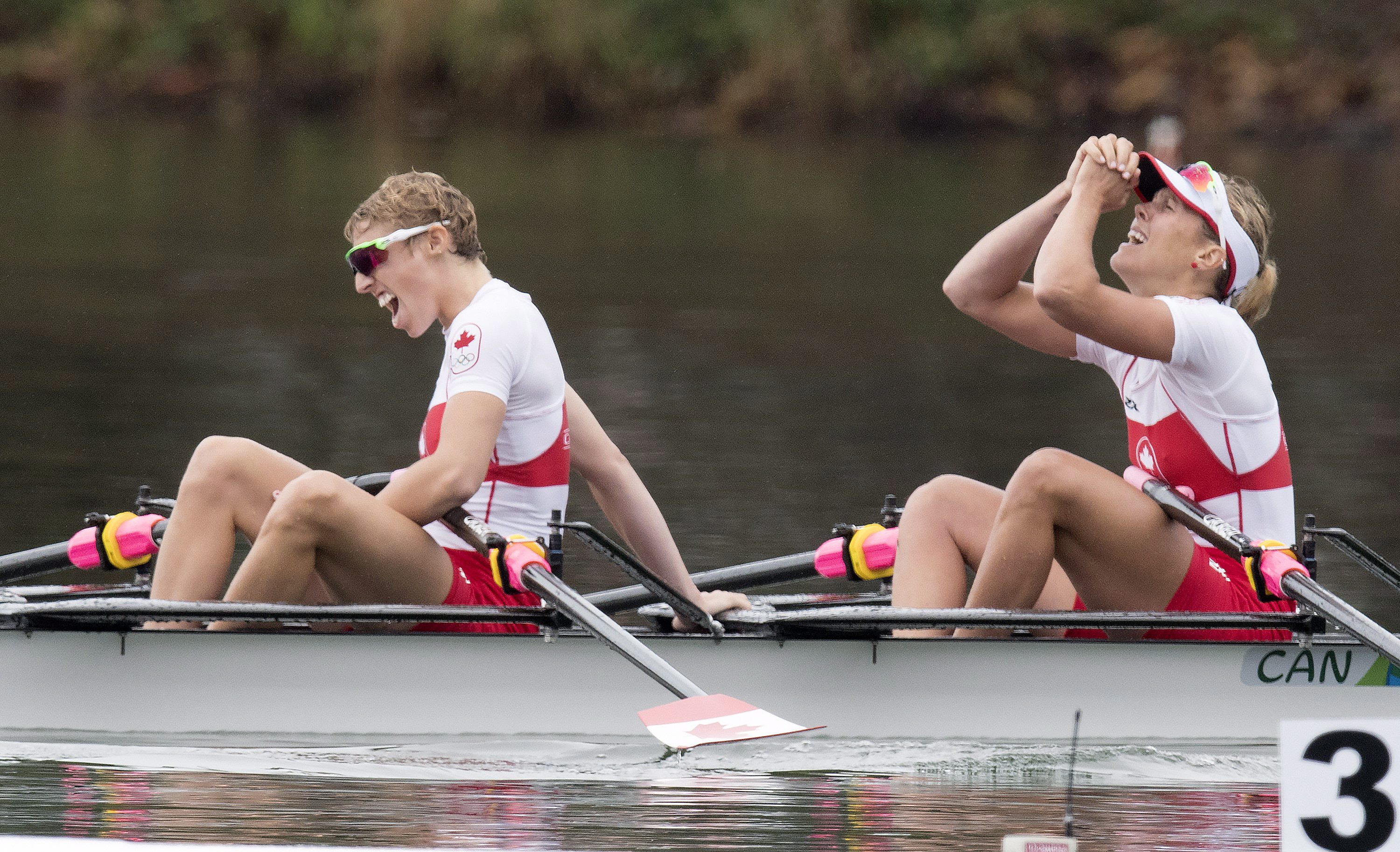 Canadian rowers Lindsay Jennerich and Patricia Obee, Left, celebrate after winning a silver medal in the women's lightweight double sculls at the 2016 Summer Olympics in Rio de Janeiro, Brazil, Friday, Aug. 12, 2016. THE CANADIAN PRESS/Frank Gunn