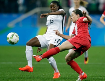 Rio Olympics Soccer Women Canada's Allysha Chapman, right, and France's Kadidiatou Diani fight for the ball during a quarter-final match of the women's Olympic football tournament between Canada and France in Sao Paulo, Brazil, Friday Aug. 12, 2016.(AP Photo/Nelson Antoine)