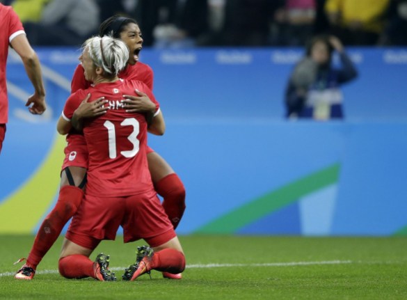Rio 2016: Sophie Schmidt, Women's Soccer Canada's Sophie Schmidt, celebrates with teammate Canada's Ashley Lawrence celebrates after scoring her team's first goal during a quarter-final match of the women's Olympic football tournament between Canada and France in Sao Paulo, Brazil, Friday Aug. 12, 2016.(AP Photo/Nelson Antoine)