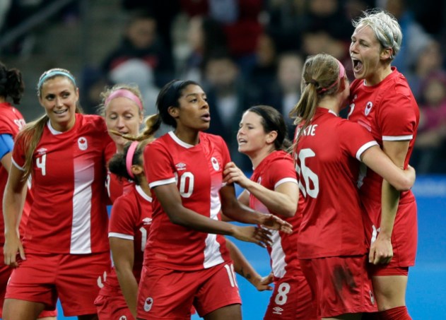 Rio Olympics Soccer Women Canada's Sophie Schmidt, right, celebrates after scoring her team's first goal during a quarter-final match of the women's Olympic football tournament between Canada and France in Sao Paulo, Brazil, Friday Aug. 12, 2016.(AP Photo/Nelson Antoine)