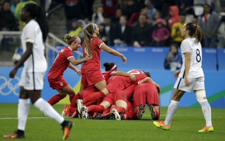 Rio 2016: Women's Soccer Canada's players celebrate after Sophie Schmidt scored her team's first goal during a quarter-final match of the women's Olympic football tournament between Canada and France in Sao Paulo, Brazil, Friday Aug. 12, 2016.(AP Photo/Nelson Antoine)