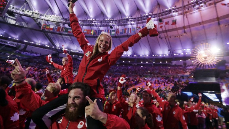 Athletes from Canada march in during the closing ceremony in the Maracana stadium at the 2016 Summer Olympics in Rio de Janeiro, Brazil, Sunday, Aug. 21, 2016. (AP Photo/David Goldman)