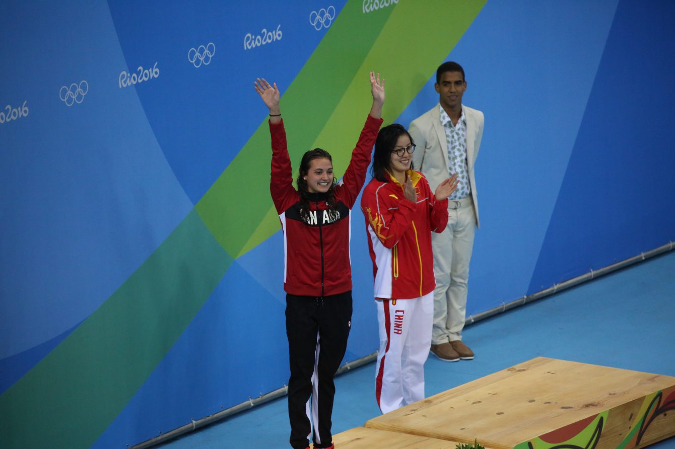 Canada's Kylie Masse being awarded her bronze medal after her 100m backstroke race on August 8, 2016 