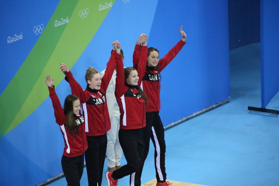 The Rio 2016 4x200m freestyle team wins bronze with Taylor Ruck, Penny Oleksiak, Brittany Maclean and Katerine Savard on August 10 2016. (Jason Ransom/COC)