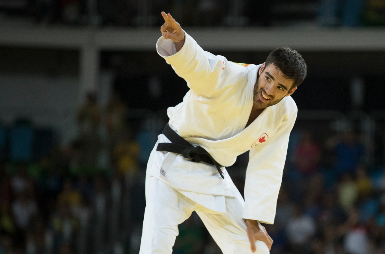 Canada's Antoine Bouchard celebrates his win over Imad Bassou of Morocco during Men's 66kg Judo, third-round action at the Olympic games in Rio de Janeiro, Brazil, Sunday, August 7, 2016. COC Photo by Jason Ransom