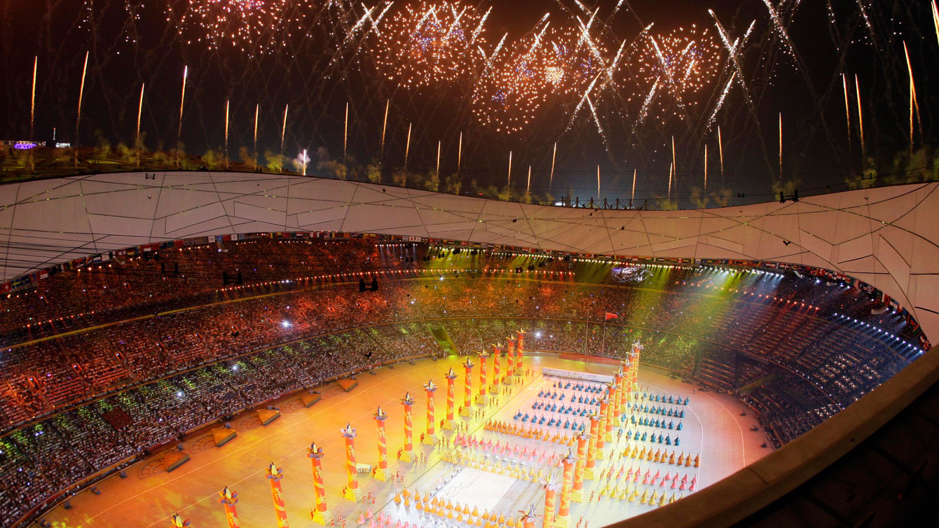 Fireworks explode over the National Stadium during opening ceremony of the 2008 Olympic Games in Beijing. (AP Photo/Julie Jacobson)
