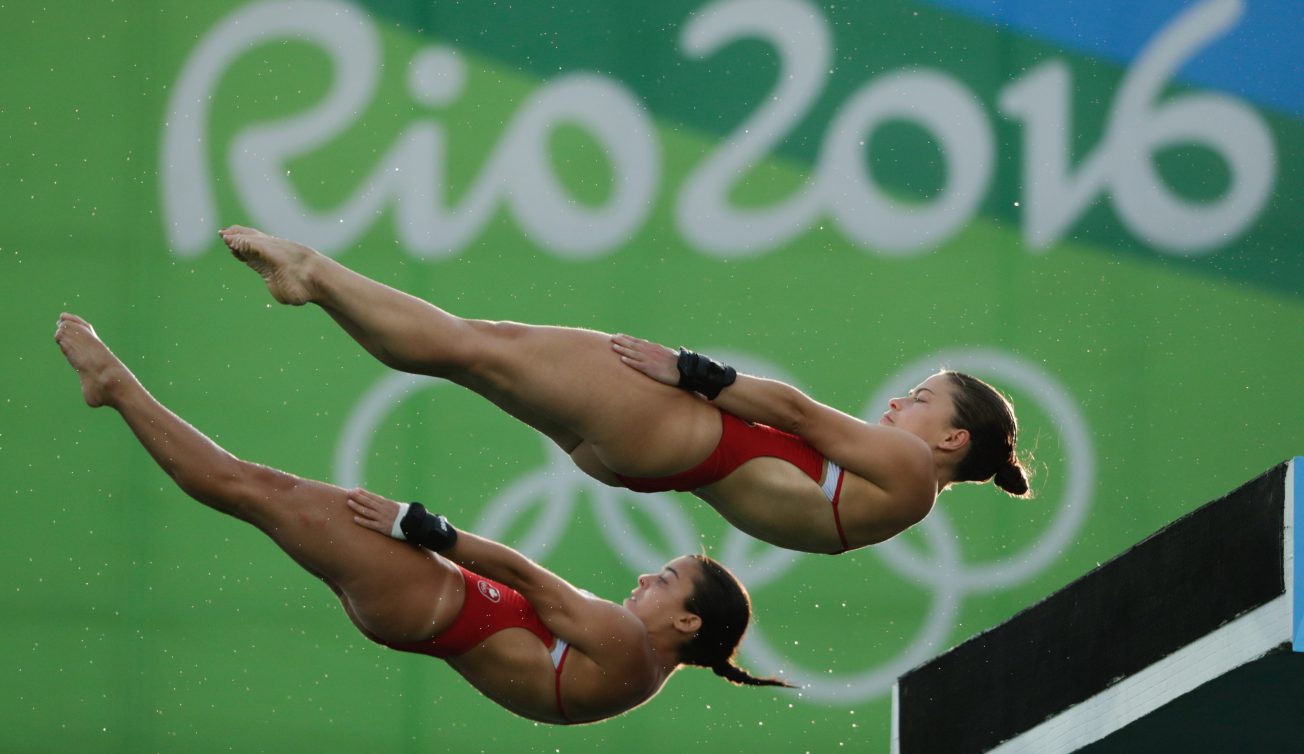 Meaghan Benfeito and Roseline Fillion of Team Canada in the third round of the Women's Synchronised 10m Platform, on August 9, 2016 in Rio. COC Photo/Jason Ransom