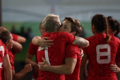 Canada's players celebrates after winning the women's rugby sevens bronze medal match against Great Britain at the Summer Olympics in Rio de Janeiro, Brazil, Monday, Aug. 8, 2016. (Photo/Stephen Hosier)