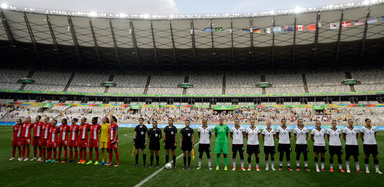 Canada and Germany line up ahead of their Rio 2016 Olympic semifinal match in Belo Horizonte on August 2016.