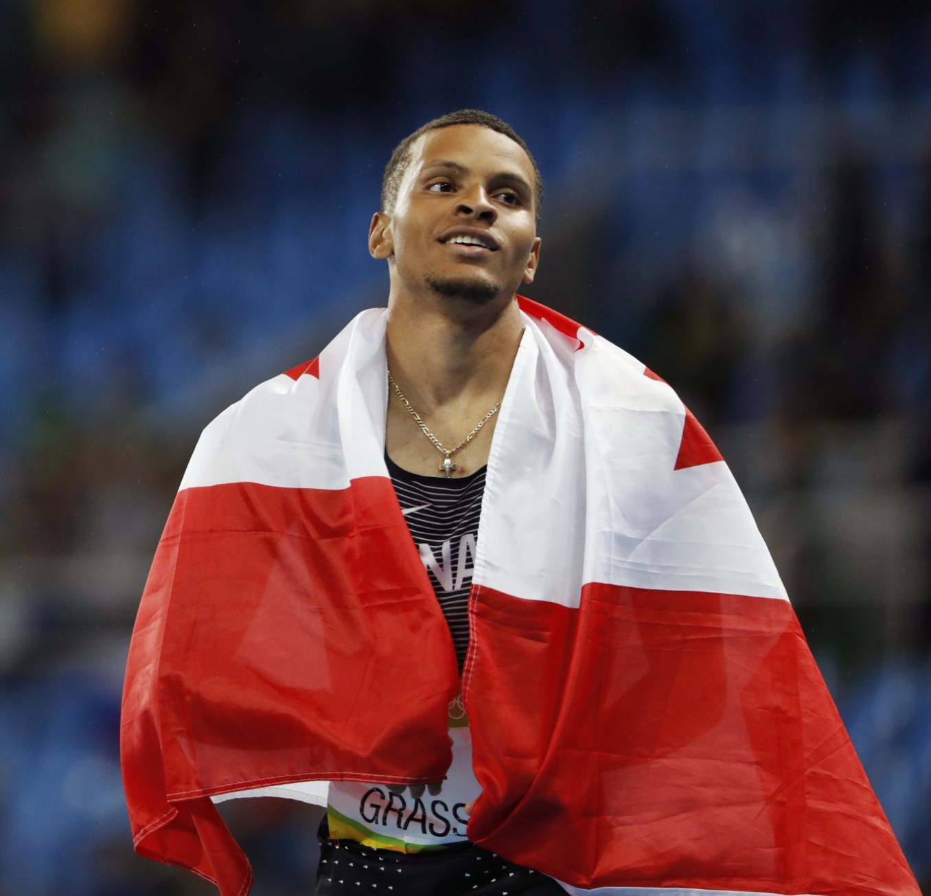 Rio 2016: De Grasse 200m Canada's Andre De Grasse celebrates silver in the men's 200m final at the 2016 Olympic Summer Games in Rio de Janeiro, Brazil on Thursday, Aug. 18, 2016. (photo/ Stephen Hosier)
