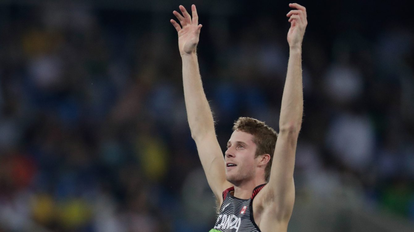 Canada's Derek Drouin during an attempt in the men's high jump final during the athletics competitions of the 2016 Summer Olympics at the Olympic stadium in Rio de Janeiro, Brazil, Tuesday, Aug. 16, 2016. (photo / Jason Ransom)