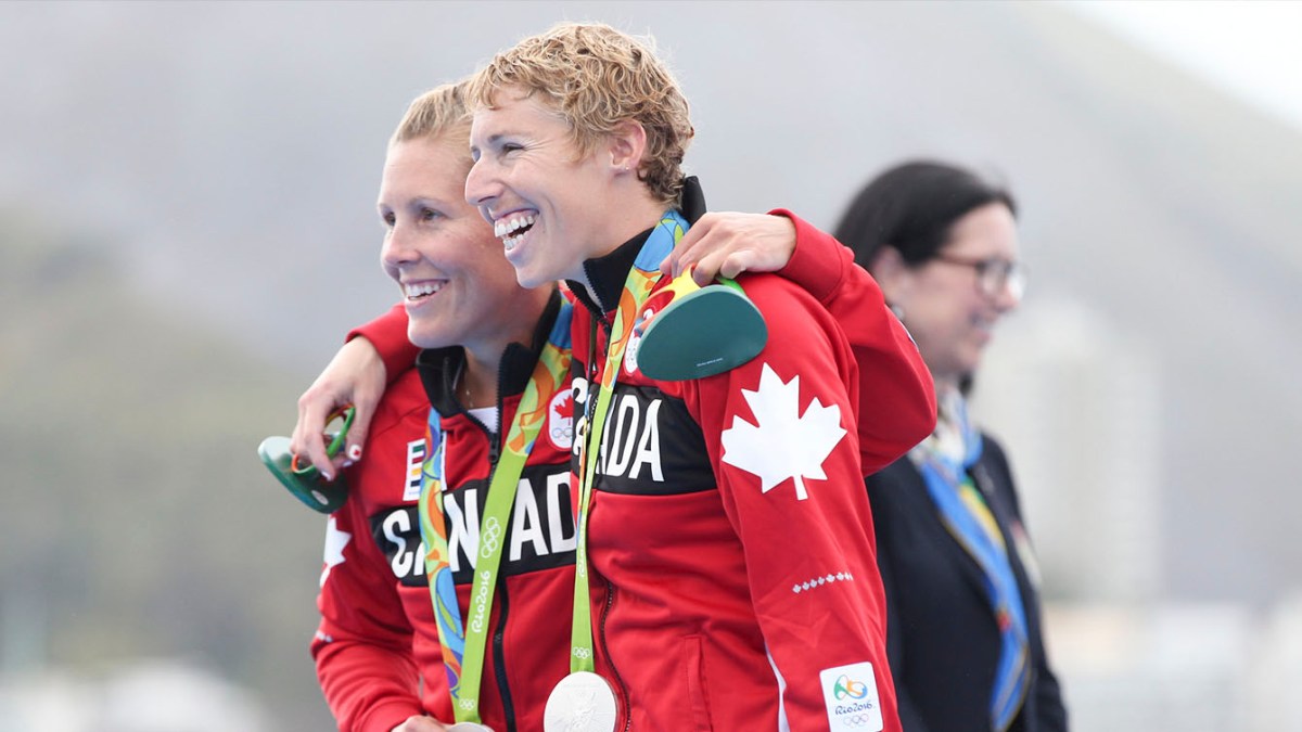 Patricia Obee and Lindsay Jennerich celebrate winning silver on Friday August 12, 2016 during lightweight women's double sculls.