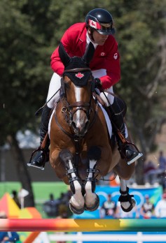 Canada's Eric Lamaze aboard his horse Fine Lady 5 competes during Equestrian Individual Jumping Final Round A at the Olympic games in Rio de Janeiro, Brazil, Friday August 19, 2016. COC Photo/Mark Blinch