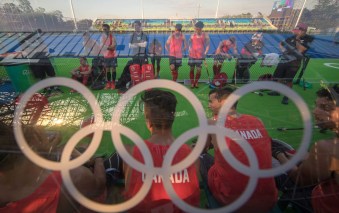 Team Canada field hockey players catch their breath during a break in the action during a friendly match against New Zealand at the Olympic games in Rio de Janeiro, Brazil, Monday, August 1, 2016. COC Photo by Jason Ransom