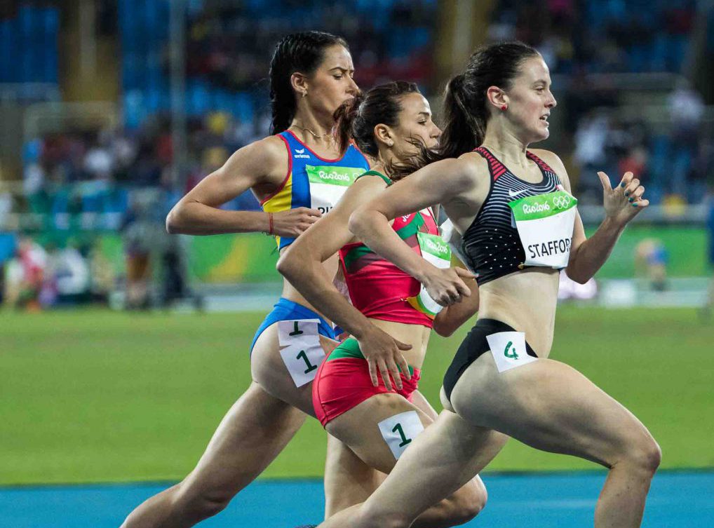 Gabriela racing alongside two opponents