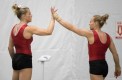 Gymnastics_Training_JasonRansomPhoto-68 Brittany Rogers, left, high-fives Ellie Black during a training session at the Olympic games in Rio de Janeiro, Brazil, Sunday, July 31, 2016. COC Photo by Jason Ransom