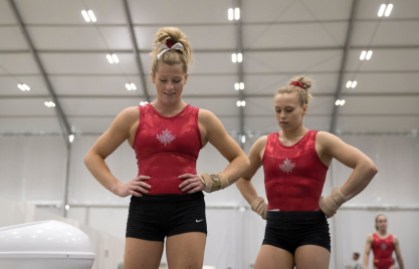 Gymnastics_Training_JasonRansomPhoto-81 Brittany Rogers and Ellie Black chat during a training session at the Olympic games in Rio de Janeiro, Brazil, Sunday, July 31, 2016. COC Photo by Jason Ransom