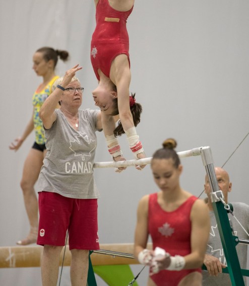 Gymnastics_Training_JasonRansomPhoto-85 Coach Lorie Henderson works with Isabela Onyshko in training session action prior to the Olympic games in Rio de Janeiro, Brazil, Sunday, July 31, 2016. COC Photo by Jason Ransom