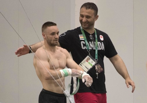 Gymnastics_Training_JasonRansomPhoto-89 Coach Vali Stan works with Scott Morgan during a training session at the Olympic games in Rio de Janeiro, Brazil, Sunday, July 31, 2016. COC Photo by Jason Ransom