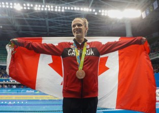 Canada's Hilary Caldwell with her bronze medal from winning the bronze medal in the women's 200-meter backstroke final during the swimming competitions at the 2016 Summer Olympics, Thursday, Aug. 12, 2016, in Rio de Janeiro, Brazil. (COC Photo/Mark Blinch)