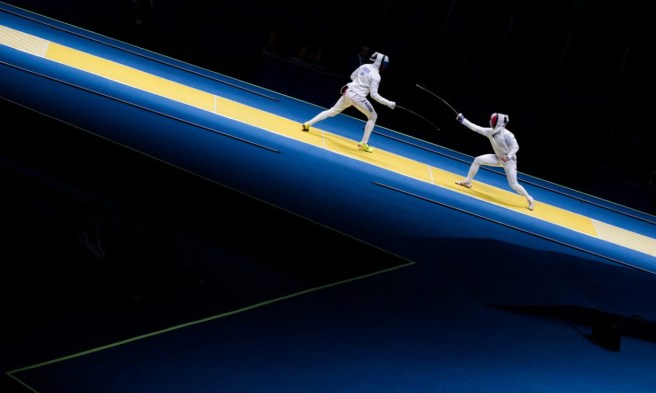 Canada's Maxime Brinck-Croteau competes against Vadim Anokhin of Russia in their Men's Epee Individual Table of 64 fencing match at the Olympic games in Rio de Janeiro, Brazil, Tuesday August 9, 2016. COC Photo/Mark Blinch