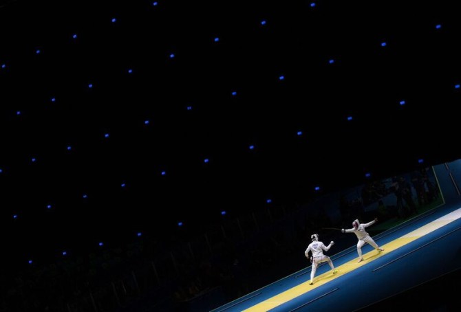 Canada's Maxime Brinck-Croteau competes against Vadim Anokhin of Russia in their Men's Epee Individual Table of 64 fencing match at the Olympic games in Rio de Janeiro, Brazil, Tuesday August 9, 2016. COC Photo/Mark Blinch