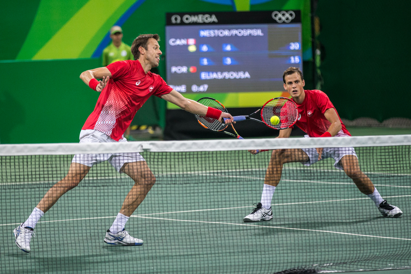 Team Canada's Daniel Nestor and Vasek Pospisil compete against Portugal in the men's second round of doubles tennis, Rio de Janeiro, Brazil, Monday August 8, 2016. COC Photo/David Jackson