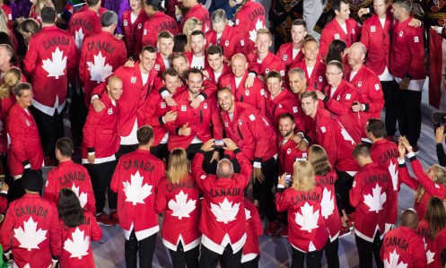 OLY 20160805 Team Canada takes pictures as they arrive during the opening ceremony for the Olympic games at Maracana Stadium in Rio de Janeiro, Brazil, Friday August 5, 2016. COC Photo/Mark Blinch