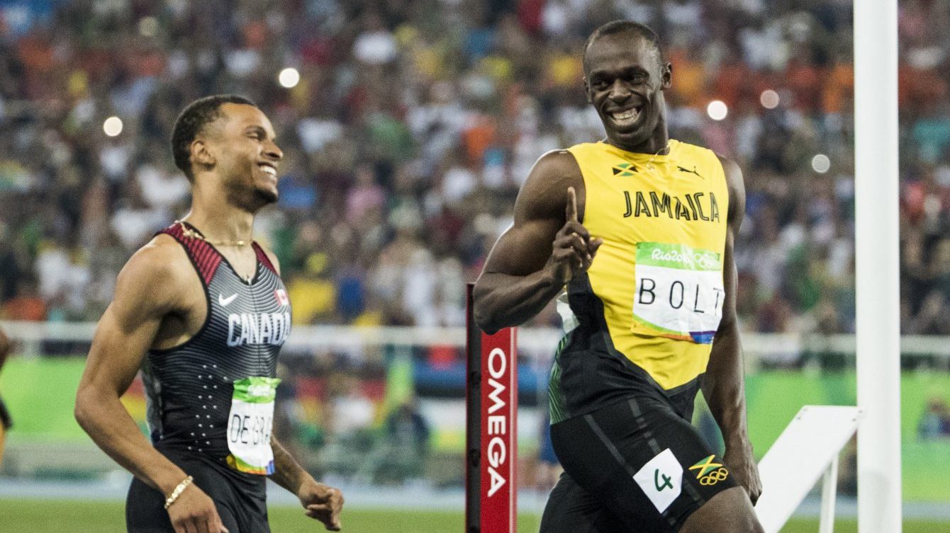 Andre De Grasse and Usain Bolt compete in the Men's 200m Semi Final at the Olympic Games in Rio de Janeiro, Brazil, Wednesday, August 17, 2016. COC Photo by Stephen Hosier