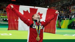 Rosie Holding Canadian flag in Rio 2016