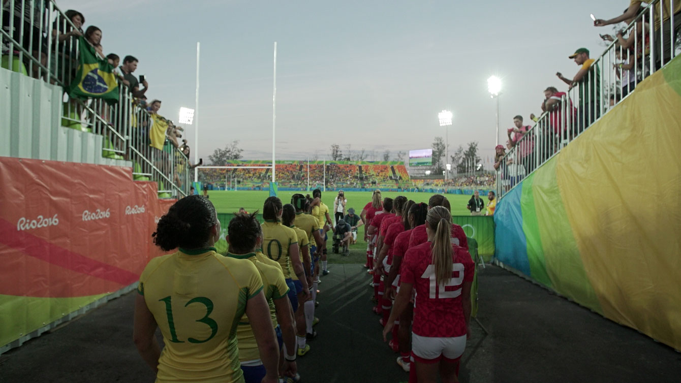 Canada (in red) and Brazil lineup ahead of their Olympic rugby match in Deodoro on August 6, 2016. 