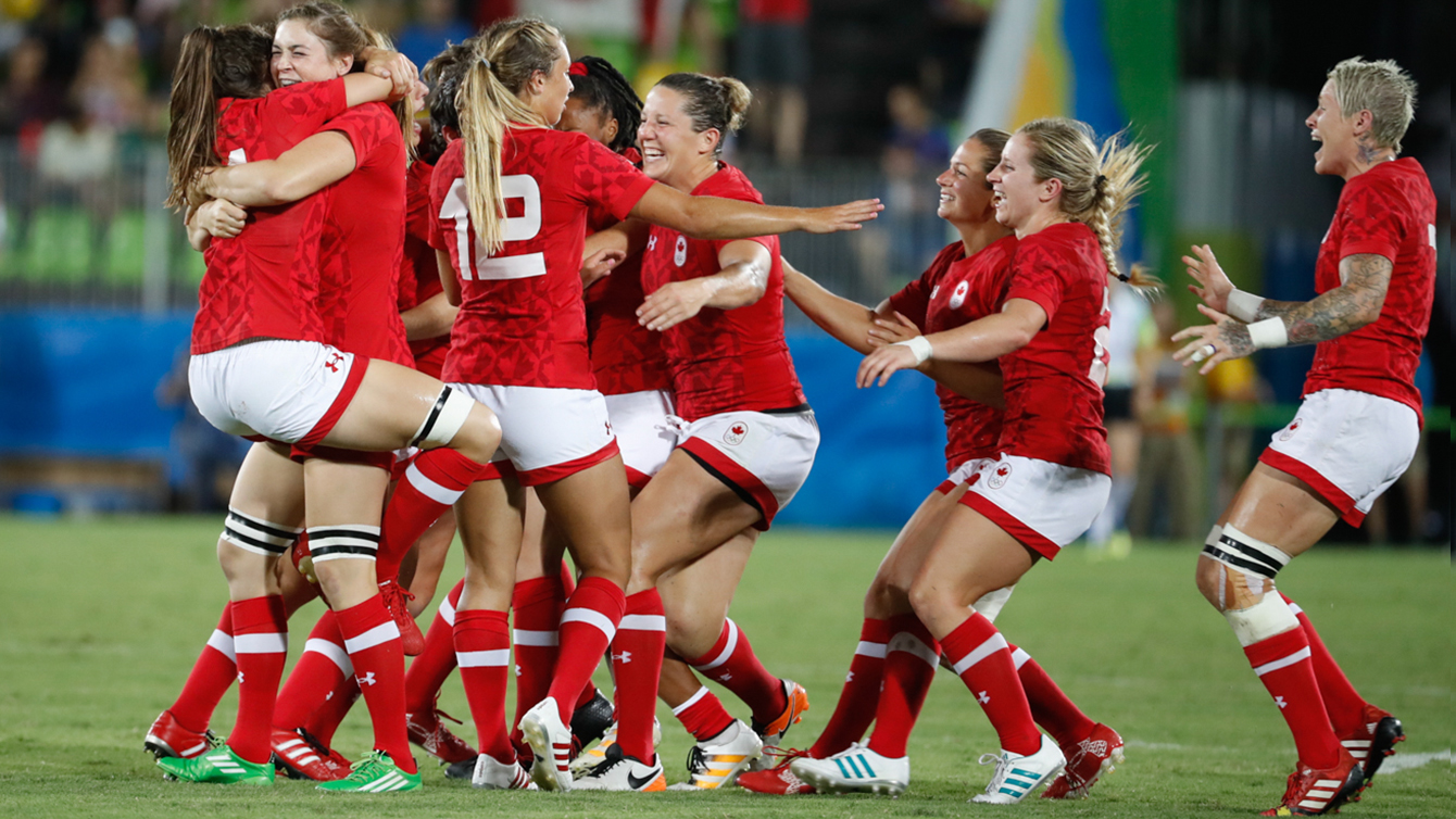 Canada celebrates their bronze medal win over Great Britain in women's rugby sevens at the 2016 Olympic Games in Rio de Janeiro, Brazil on Monday, Aug. 8, 2016. (COC/Mark Blinch)