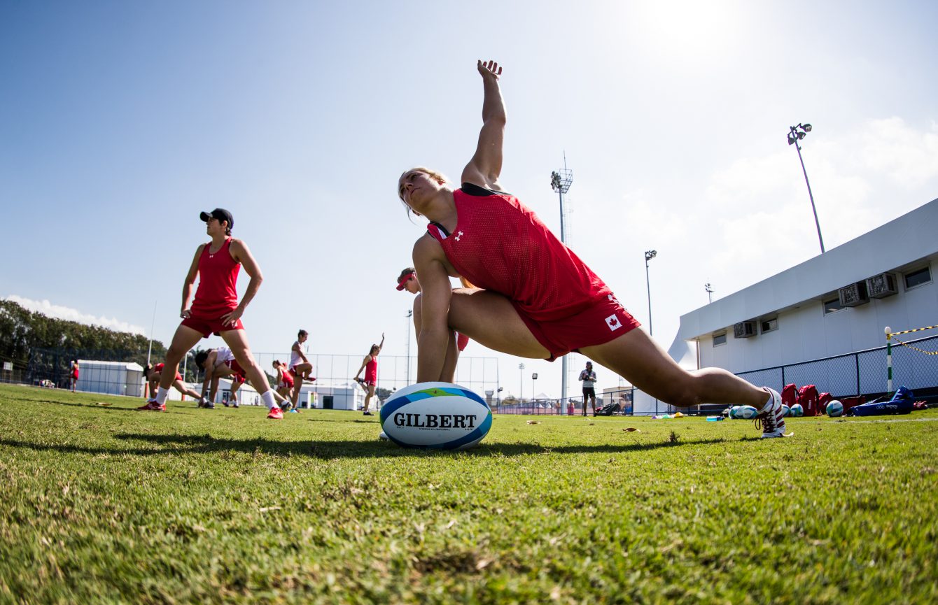 Megan Lukan stretches during team Canada women's rugby practice ahead of the Olympic games in Rio de Janeiro, Brazil, Tuesday August 2, 2016. COC Photo/Mark Blinch