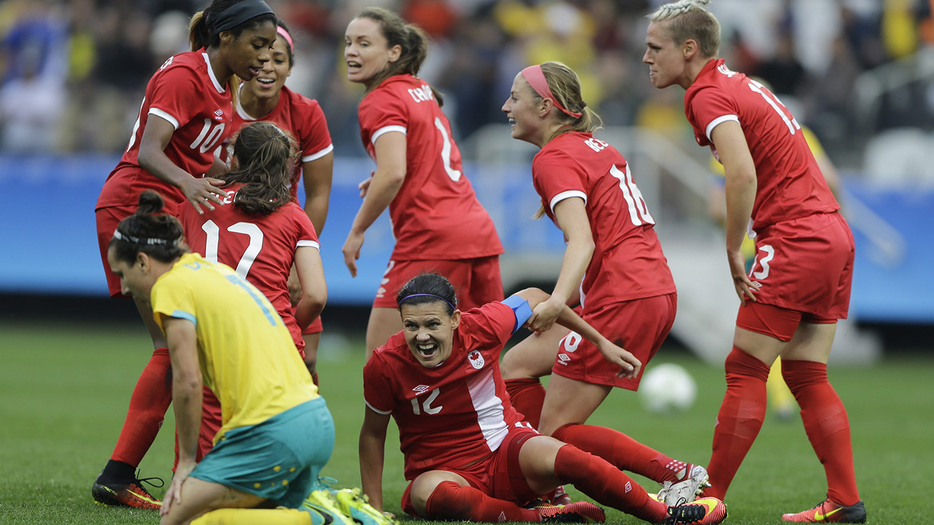 Canada's Christine Sinclair, center, celebrates with teammates after scoring her team's second goal during the 2016 Summer Olympics football match at the Arena Corinthians in Sao Paulo, Brazil, Wednesday, Aug. 3, 2016. Canada won 2-0. (AP Photo/Nelson Antoine)