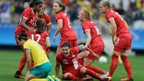 Canada's Christine Sinclair, center, celebrates with teammates after scoring her team's second goal during the 2016 Summer Olympics football match at the Arena Corinthians in Sao Paulo, Brazil, Wednesday, Aug. 3, 2016. Canada won 2-0. (AP Photo/Nelson Antoine)
