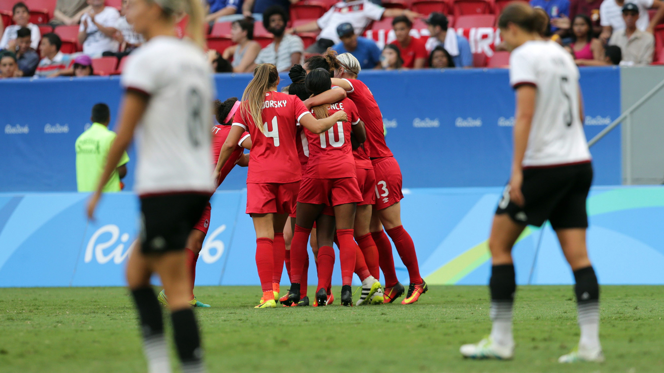 Canada's players celebrate after scoring their second goal during a F match of the women's Olympic football tournament between Germany and Canada at the National Stadium, in Brasilia, Brazil, Tuesday, Aug. 9, 2016. (AP Photo/Eraldo Peres)