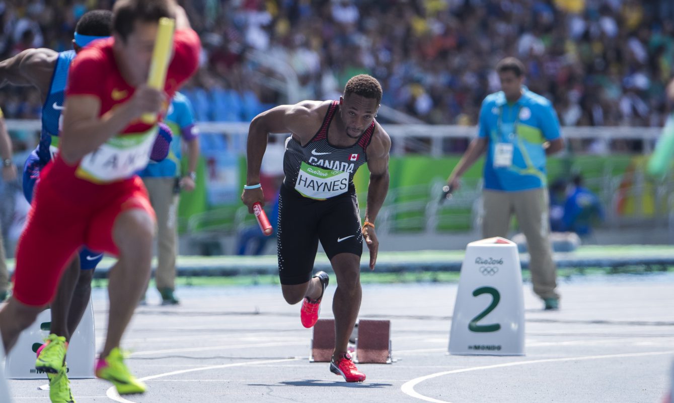 Akeem Haynes competes in Heat 1 - Round 1 of the Men's 4x100m Relay at the Olympic Games in Rio de Janeiro, Brazil, Thursday, August 18, 2016. COC Photo by Stephen Hosier