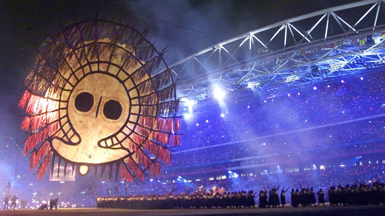 An Aboriginal icon is raised during the Opening Ceremony of Sydney 2000 at the Olympic Stadium, Sept. 15, 2000. (AP Photo/David Guttenfelder)