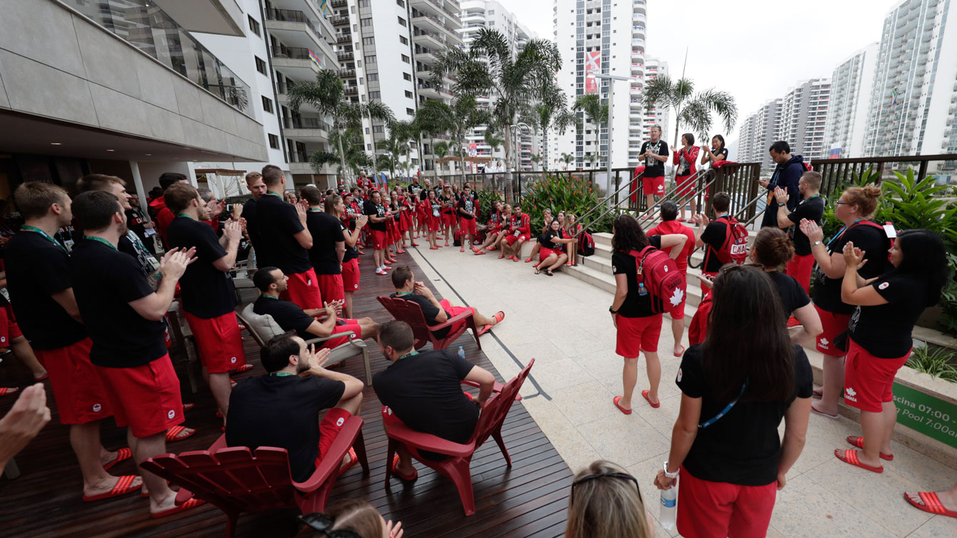 Team Canada receives a talk from chef de mission Curt Harnett ahead of its march to the Olympic village welcoming ceremony on August 2, 2016.