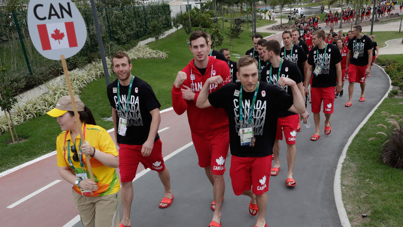 Team Canada begins to march toward the Olympic village welcoming ceremony on August 2, 2016. 