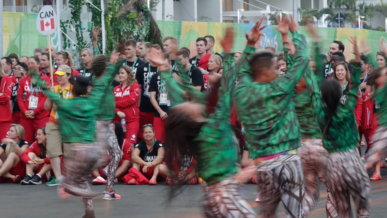 Team Canada greeted by Brazilian dancers at the Olympic village welcoming ceremony on August 2, 2016 (Jason Ransom/COC).