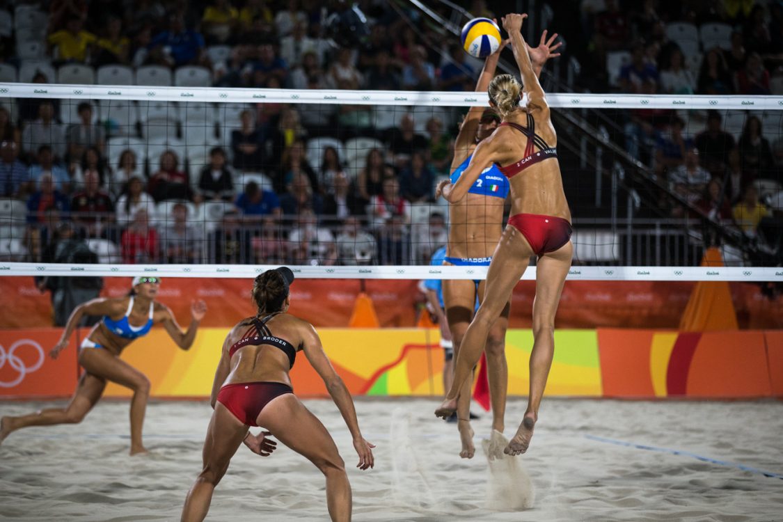 Team Canada's women's beach volleyball duo, Kristina Valjas and Jamie Broder, battle in a preliminary match against Italy, Copacabana Beach, Rio de Janeiro, Brazil, Sunday August 7, 2016. COC Photo/David Jackson