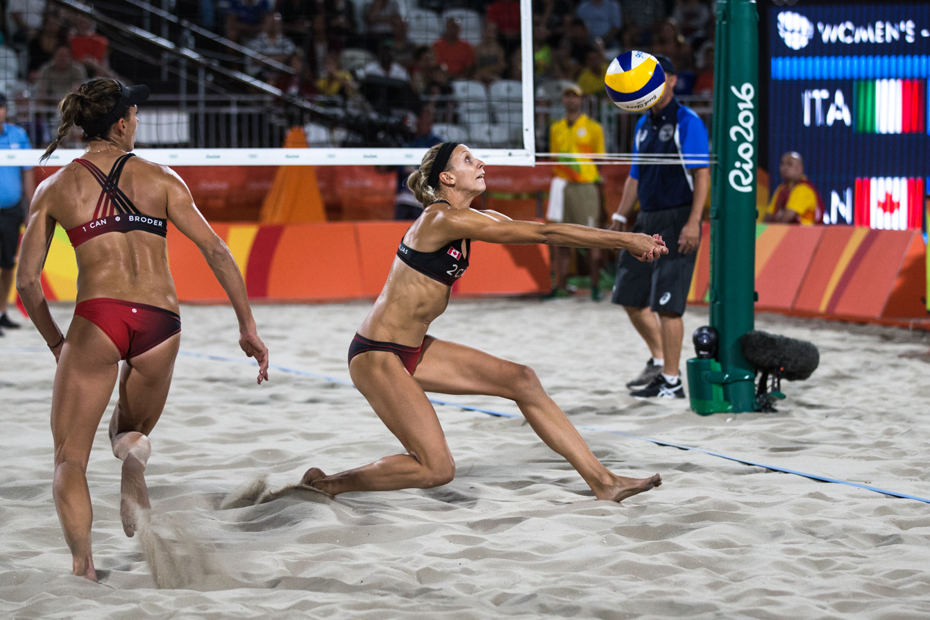 Team Canada's women's beach volleyball duo, Kristina Valjas and Jamie Broder, battle in a preliminary match against Italy, Copacabana Beach, Rio de Janeiro, Brazil, Sunday August 7, 2016. COC Photo/David Jackson